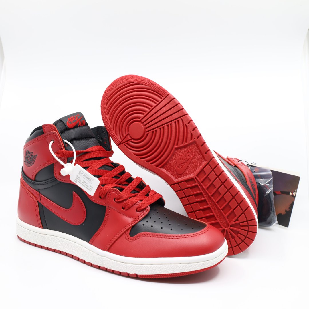 Red and black high-top sneakers product photo